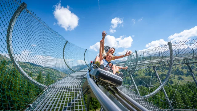 Famiglia Vars in slitta e lago Peyrol Alpesphotographies.com 12